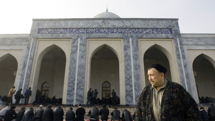 Muslims attend Friday prayers at the Hoje Ahror Vali mosque in Tashkent