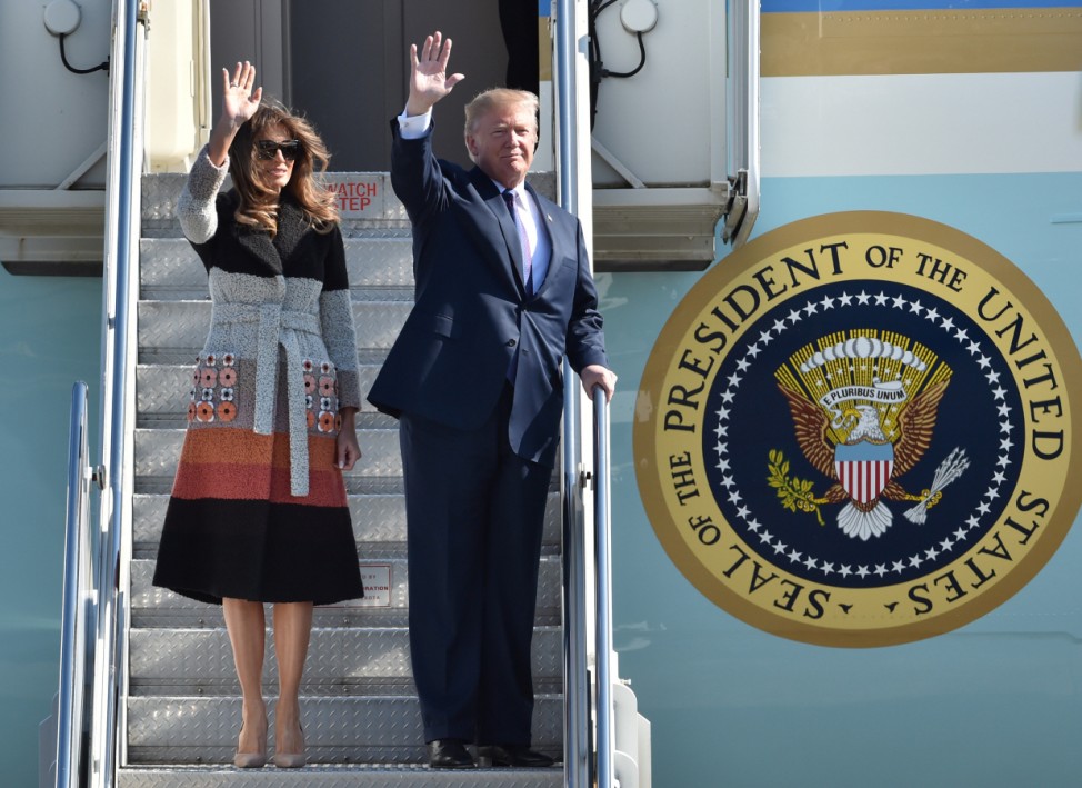 U.S. President Donald Trump and his wife Melania arrive at U.S. Air Force Yokota Air Base in Fussa