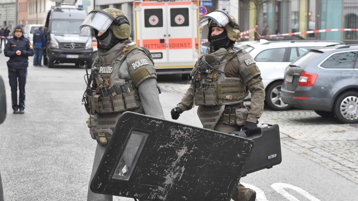 German special police arrive at the scene during a hostage taking at a district office in Pfaffenhofen