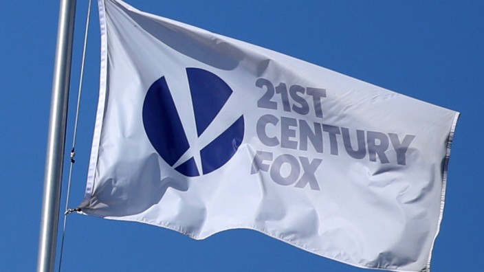 FILE PHOTO: The Twenty-First Century Fox Studios flag flies over the company building in Los Angeles