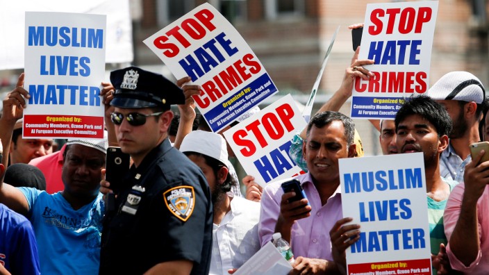 FILE PHOTO: Community members take part in a protest to demand stop hate crime during the funeral service of Maulama Akonjee, and Uddin in the Queens borough of New York City