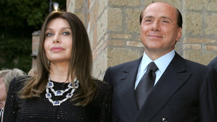 FILE PHOTO: Italy's Prime Minister Silvio Berlusconi and his wife Veronica Lario pose at Villa Madama in Rome