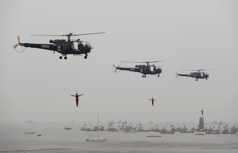 Indian Navy marine commandos demonstrate their skills during Navy Day celebrations in Mumbai