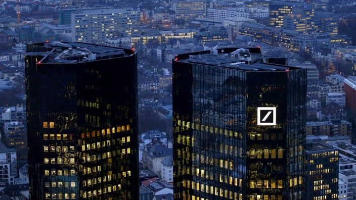 FILE PHOTO: The headquarters of Germany's Deutsche Bank is seen early evening in Frankfurt