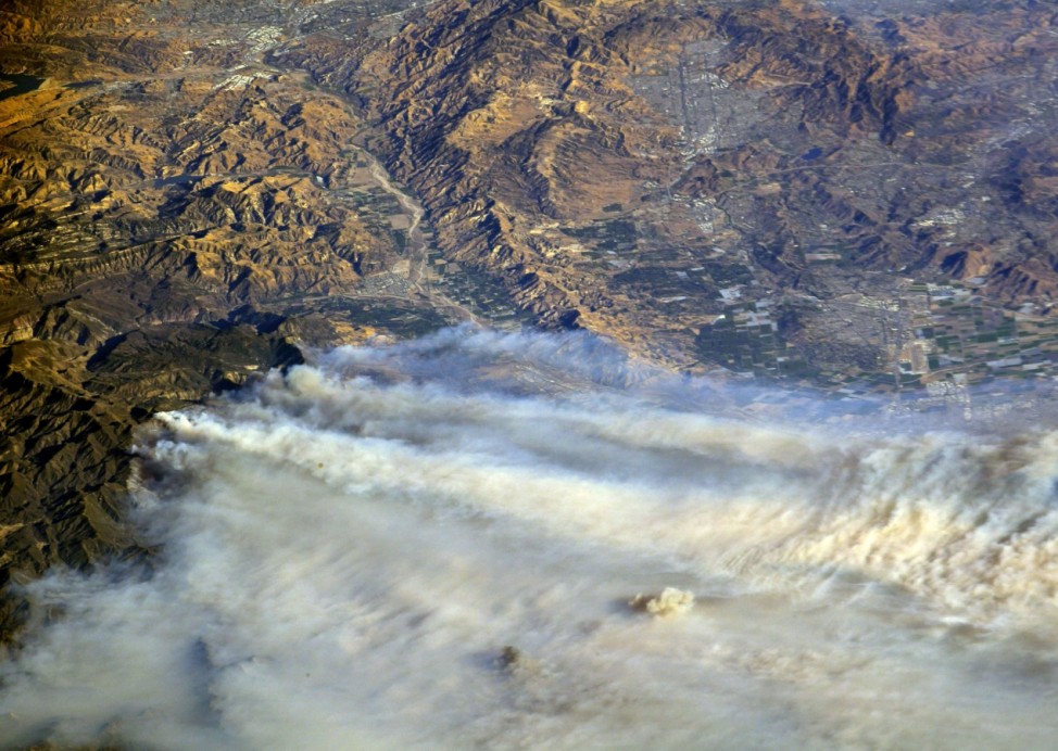 A photo taken from the International Space Station shows smoke rising from wildfire burning in Southern California