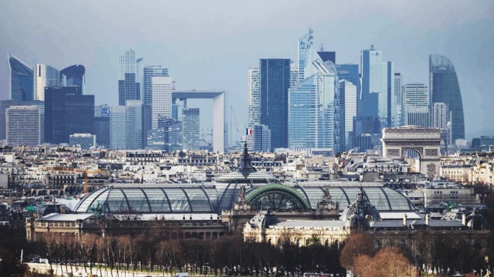 FILE PHOTO: General view of the skyline of La Defense business district as the the Grand Palais is seen in central Paris