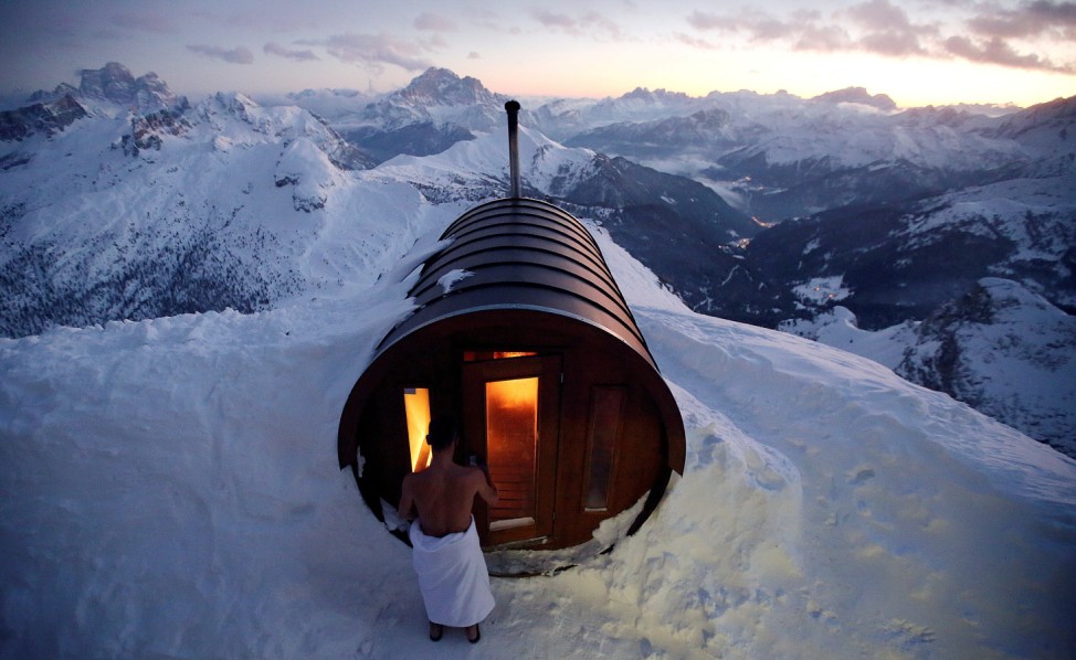 A person enter in sauna on the peak of Mount Lagazuoi in Cortina D'Ampezzo