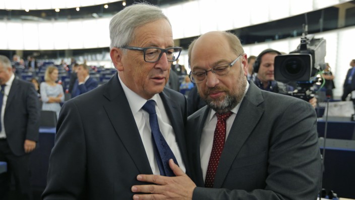 European Commission President Juncker talks with European Parliament President Schulz ahead of his address to the European Parliament in Strasbourg