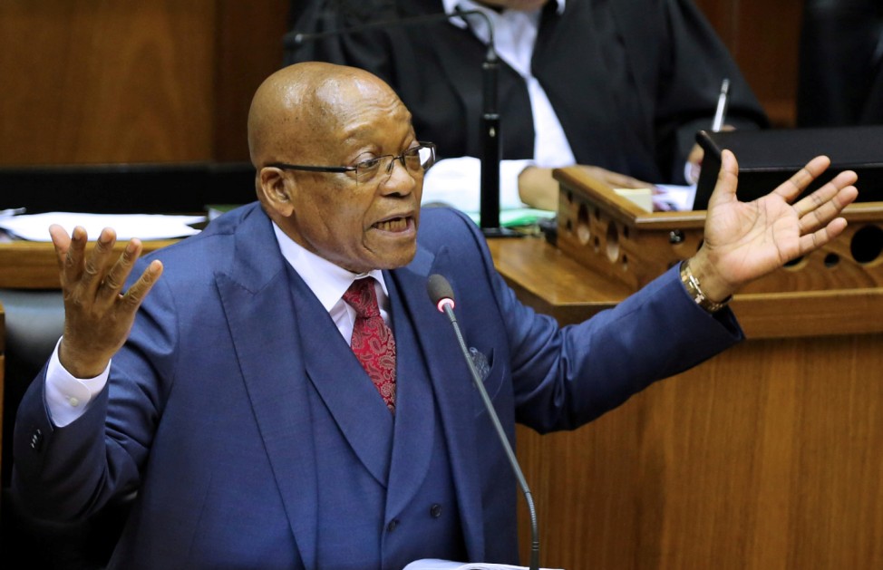 FILE PHOTO: President Jacob Zuma gestures as he addresses parliament in Cape Town