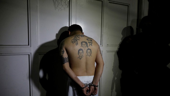 MS-13 gang member Alvaro Alexander Alvarado, known as 'Sniper' is detained during the Cuscatlan Operation under charges of money laundering, in Ilopango