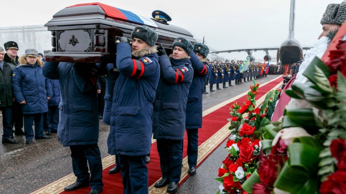 VORONEZH RUSSIA FEBRUARY 8 2018 Servicemen carry a coffin with the body of Russian pilot Roman
