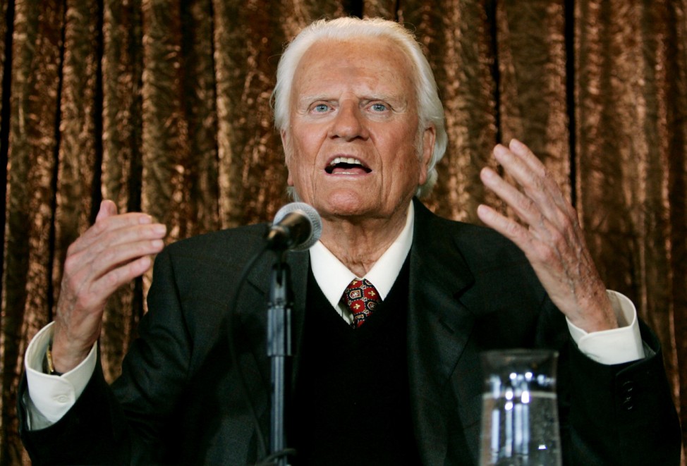 FILE PHOTO:  Evangelist Billy Graham speaks to members of the media at a news conference in New York