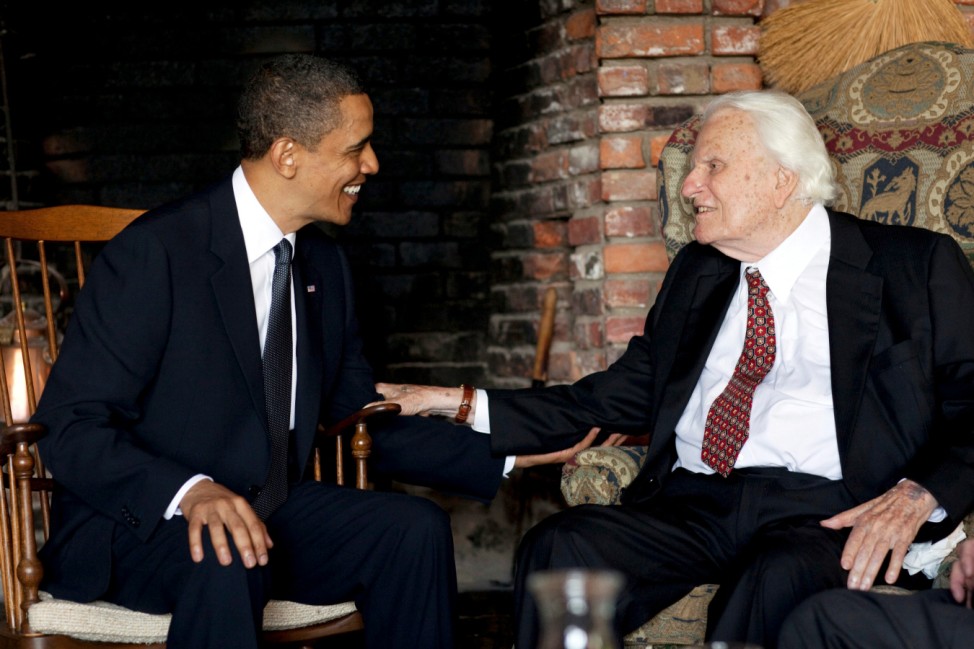 FILE PHOTO: Handout photo of U.S. President Obama meeting with the Rev. Billy Graham at his house in Montreat