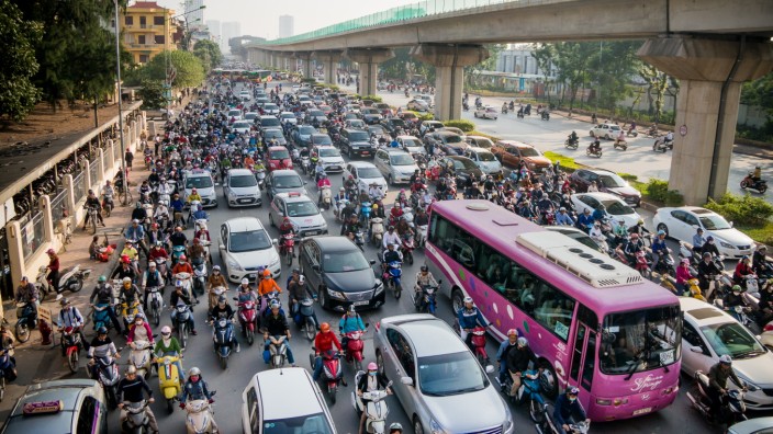 Vietnamese Motorists Battle Air Pollution In Fashion