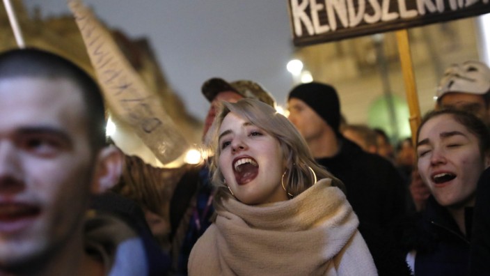 Protesters rally during a student-organizedanti-government demonstration in Budapest