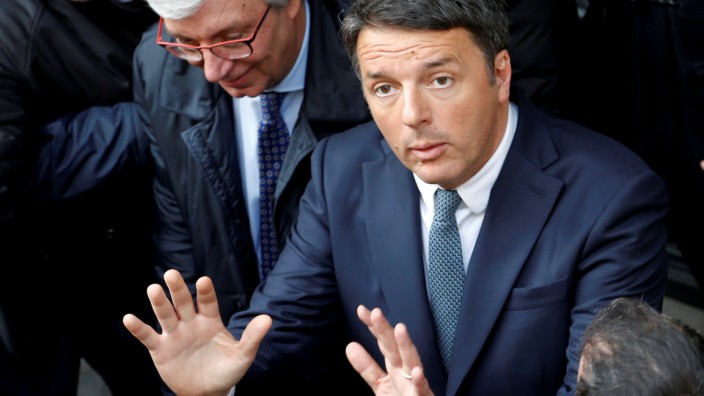 FILE PHOTO: PD party leader Matteo Renzi gestures during a political rally in Naples