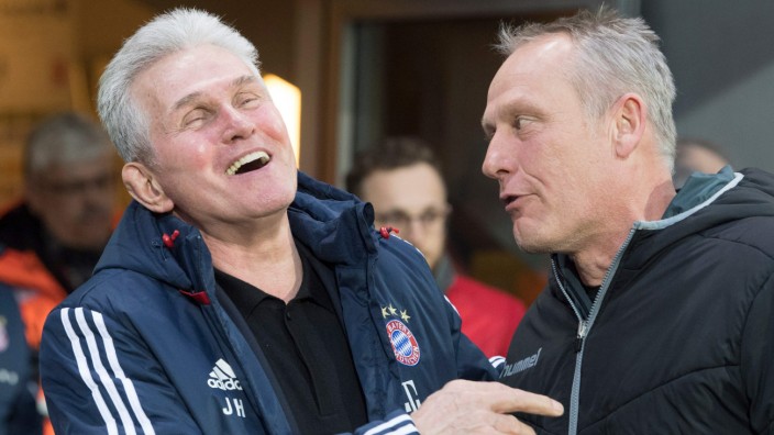 FC Bayern: Verstanden sich blendend: Bayern-Coach Jupp Heynckes (links) und sein Freiburger Kollege Christian Streich.