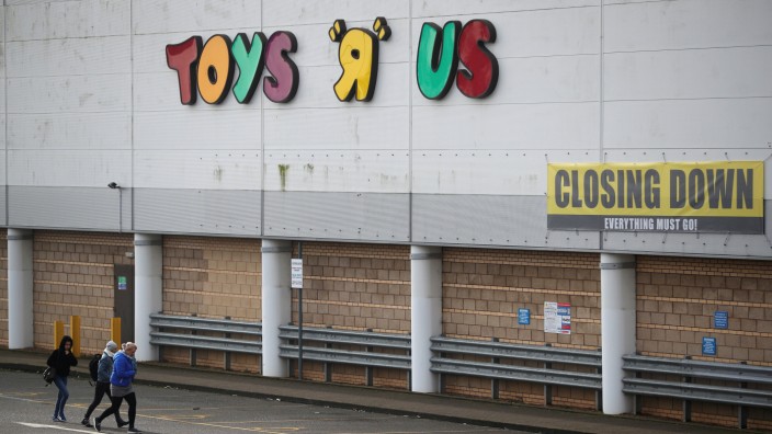 Closing down signs are seen outside the Toys R Us store in Coventry
