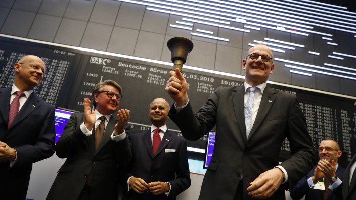 Bernd Montag, CEO of Siemens Healthineers rings the bell for the official share trading start following an initial public offering (IPO) at the trading floor of FrankfurtâÄÖs stock exchange in Frankfurt