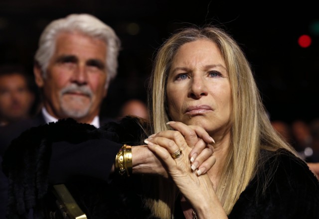 Streisand listens to Obama speak at the USC Shoah gala in Los Angeles