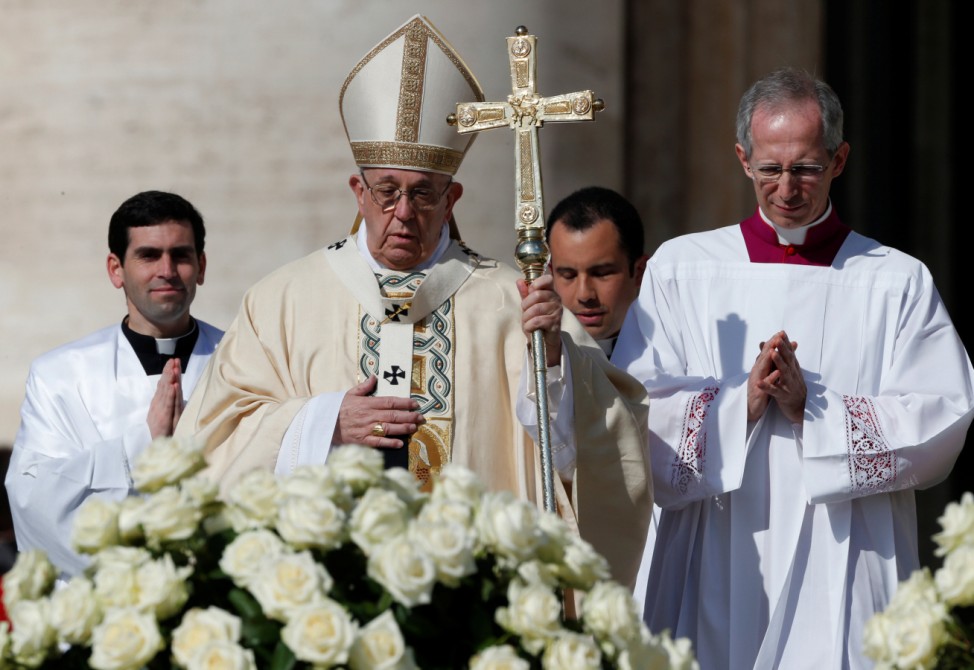 Pope Francis arrives to lead the Easter Mass at St. Peter's Square at the Vatican