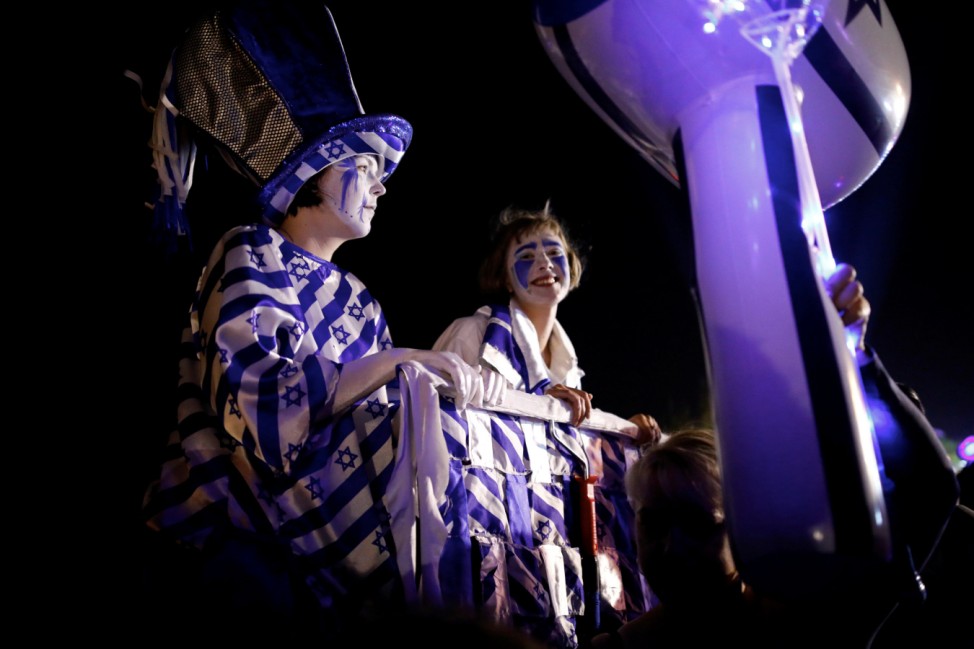 Israelis take part in celebrations marking Israel's 70th Independence Day in the southern city of Ashkelon