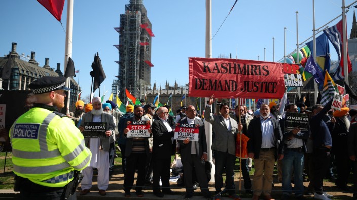 Demonstrators stage a protest against the visit by India's Prime Minister Narendra Modi in Parliament Square, London
