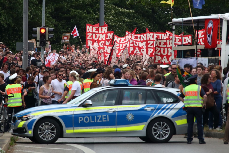 German police car blocks a demonstration to protest against the Bavarian new law on police duty in Munich