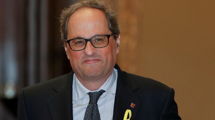 Candidate for head of Catalan regional government Quim Torra arrives to the parliament in Barcelona