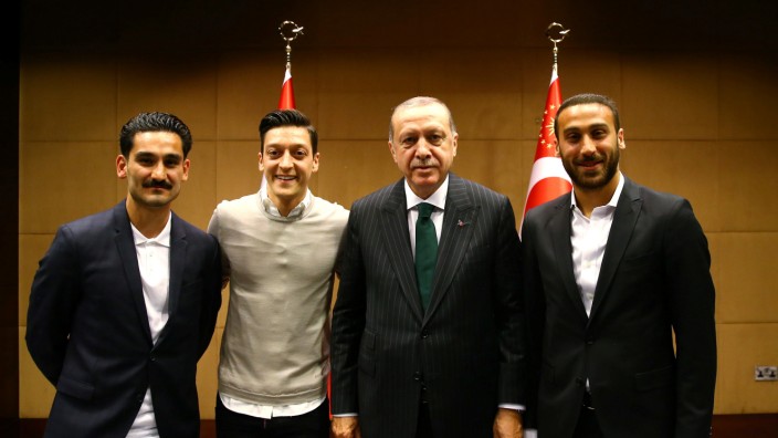 Turkish President Erdogan meets with Premier League soccer players Gundogan of Manchester City, Ozil of Arsenal and Tosun of Everton in London