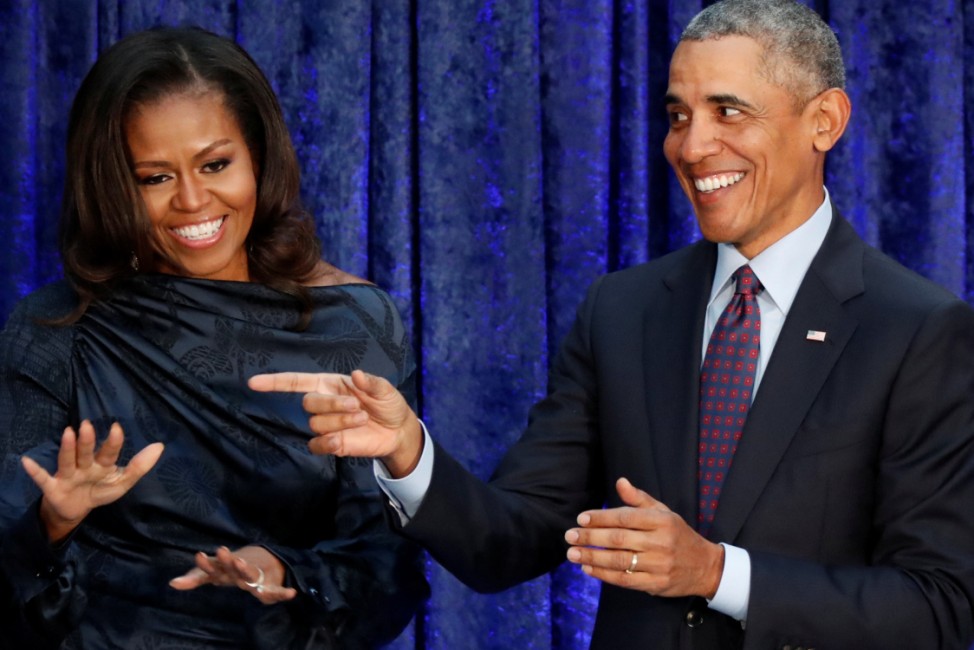 FILE PHOTO: Former U.S. President Obama and first lady Michelle Obama acknowledge guests during  portraits unveiling at the SmithsonianâÄÖs National Portrait Gallery in Washington