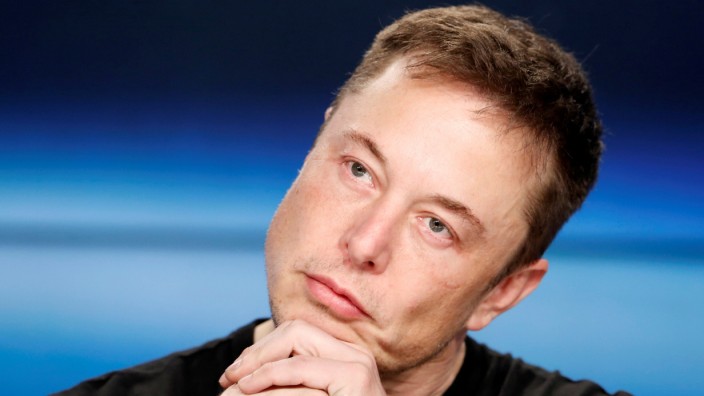 FILE PHOTO: Elon Musk at a press conference following the first launch of a SpaceX Falcon Heavy rocket in Cape Canaveral