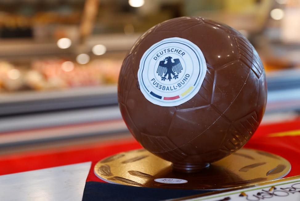 A chocolate ball with the German national soccer team logo is seen in a pastry shop in Eppan