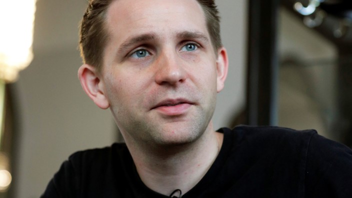 Austrian lawyer and privacy activist Schrems speaks during a Reuters interview in Vienna