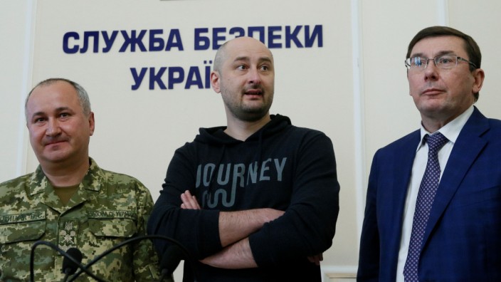 Russian journalist Babchenko, who was reported murdered in the Ukrainian capital, Ukrainian Prosecutor General Lutsenko and SBU chief Gritsak attend a news briefing in Kiev