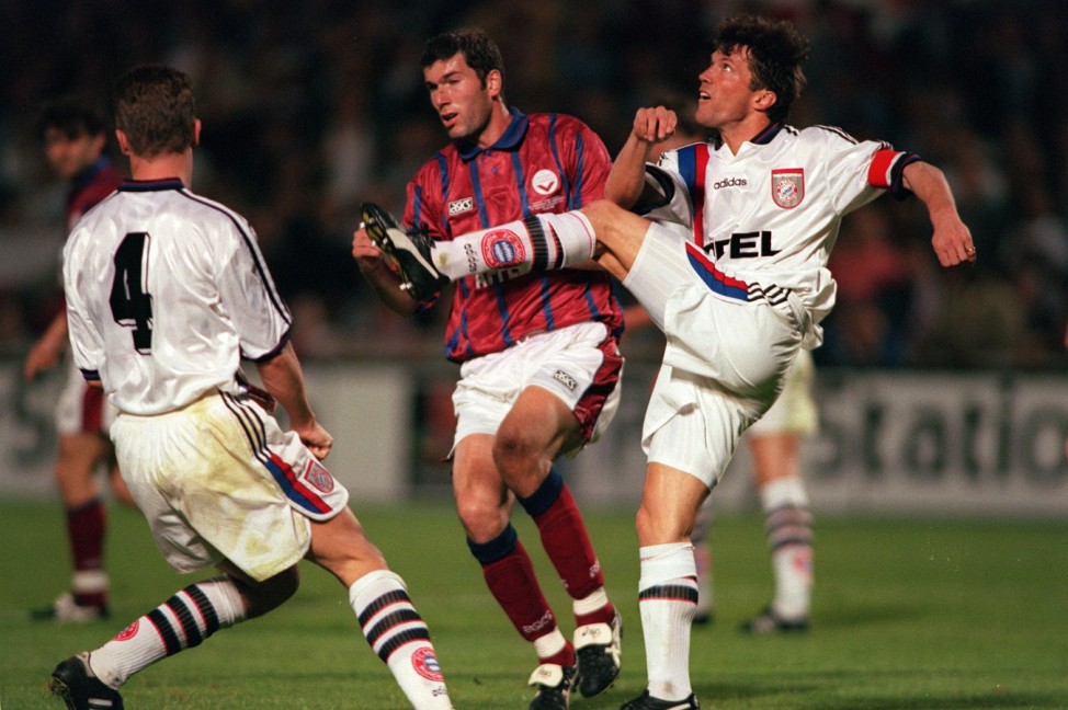 Football. UEFA Cup Final, Second Leg. France. 15th May 1996. Bordeaux 1 v Bayern Munich 3 (Bayern Munich win 5-1 on aggregate). Bayern Munich captain Lothar Matthaus clears from Bordeaux's Zinedine Zidane.; Zidane