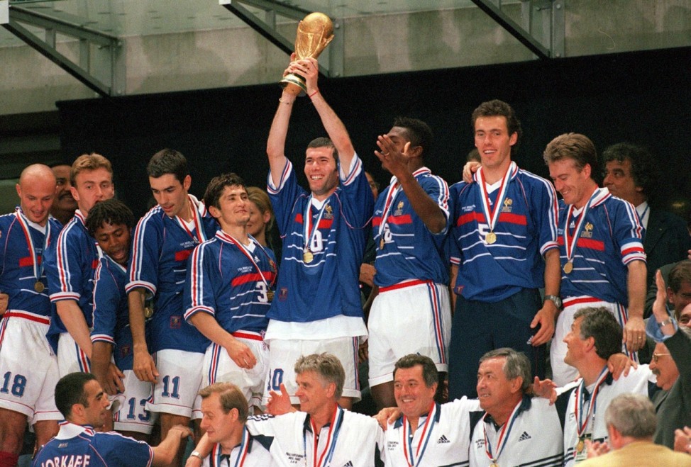 1998 World Cup Final. St. Denis, France. 12th July, 1998. France 3 v Brazil 0. France's Zinedine Zidane lifts the World Cup trophy as France become World champions.; Zidane