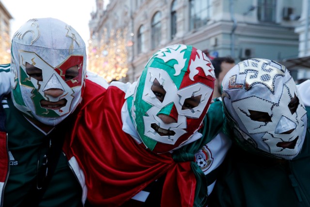 Supporters of the Mexican national soccer team pose during a gathering on the first day of the 2018 FIFA World Cup in central Moscow