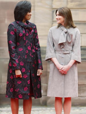 Michelle Obama, Carla Bruni-Sarkozy; AP