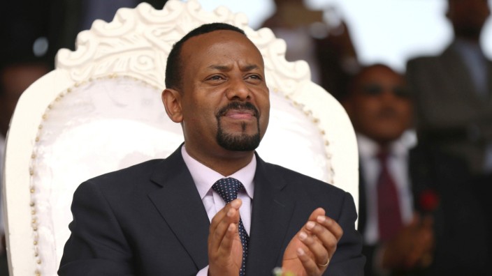 FILE PHOTO: Ethiopia's Prime Minister Abiy Ahmed attends a rally during his visit to Ambo in the Oromiya region