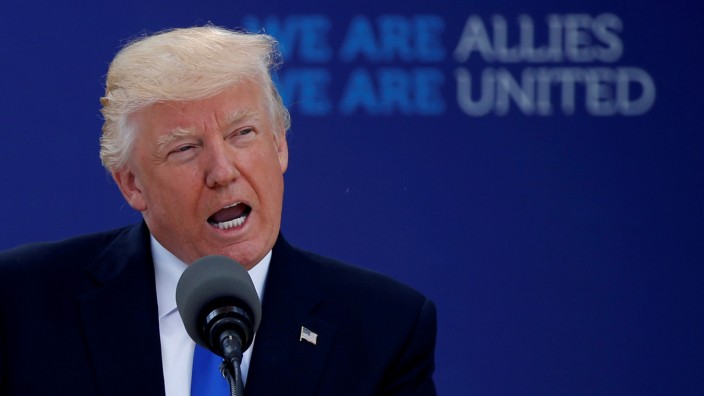 FILE PHOTO: U.S. President Donald Trump attends a NATO Summit at the NATO headquarters during a NATO summit in Brussels