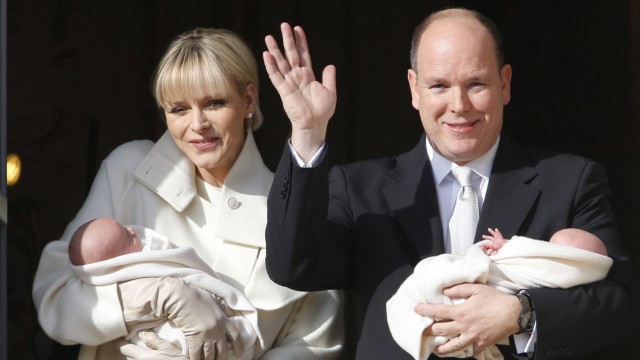 Prince Albert II of Monaco and his wife Princess Charlene hold their twins Prince Jacques and Princess Gabriella as they stand at the Palace Balcony during the official presentation of the Monaco's newborn royals in Monaco