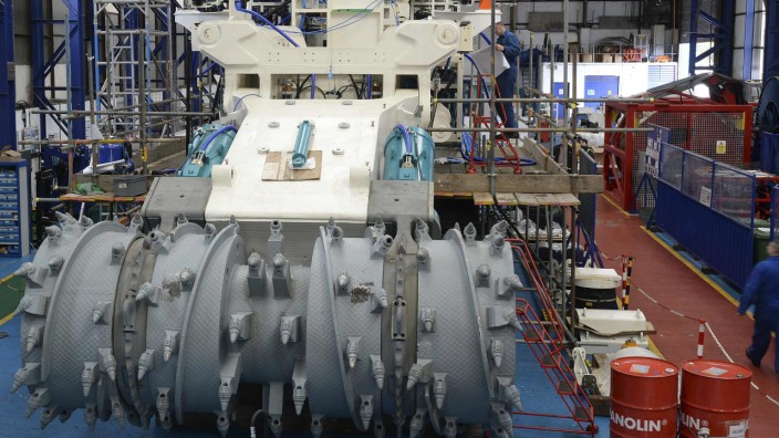 Employees of Soil Machine Dynamics work on a subsea mining machine being built for Nautilus Minerals at Wallsend