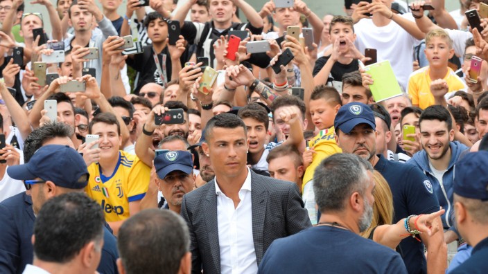 Cristiano Ronaldo arrives at the Juventus' medical center in Turin