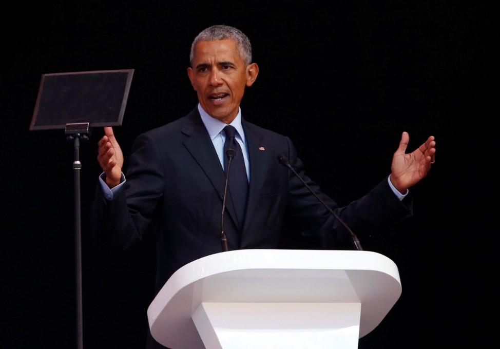 Former U.S. President Barack Obama  delivers the 16th Nelson Mandela annual lecture, marking the centenary of the anti-apartheid leader's birth, in Johannesburg
