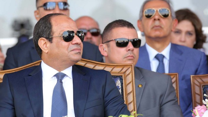Egyptian President Abdel Fattah al-Sisi attends during the first anniversary of launching the New Suez Canal and the 60th anniversary of nationalizing the Suez Canal in Ismailia