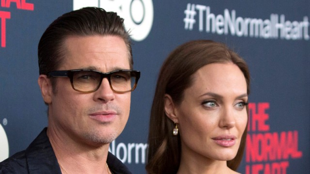 FILE PHOTO: Brad Pitt and Angelina Jolie attend the premiere of The Normal Heart in New York