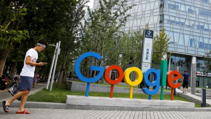 The brand logo of Alphabet Inc's Google is seen outside its office in Beijing