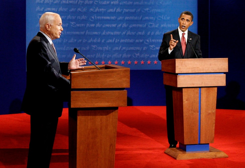 FILE PHOTO -  McCain and Obama take part in the first 2008 U.S. presidential debate at the University of Mississippi in Oxford