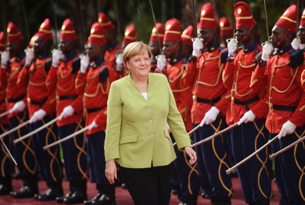 German Chancellor Angela Merkel arrives at the Presidential Palace in Dakar